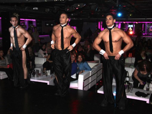 a group of people standing in a room